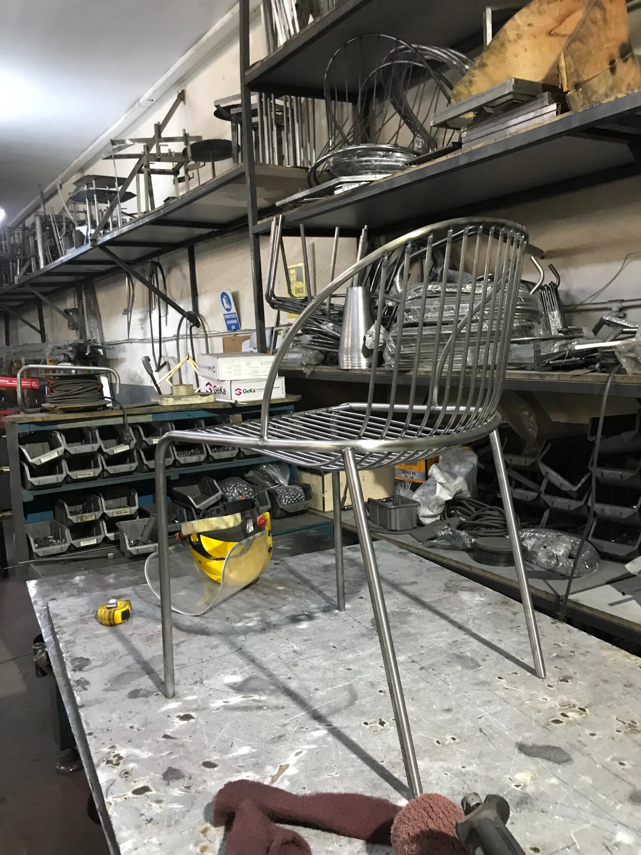 Steel Wire Chair on Work Bench
